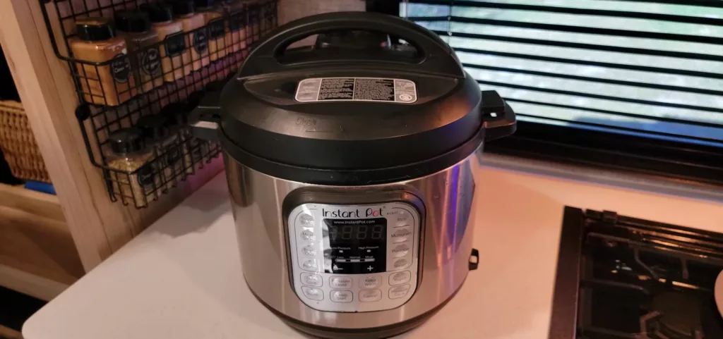 RV kitchen tips from TheRoadRoamers—discover smart storage, multi-use appliances, and outdoor cooking hacks for full-time RV living.